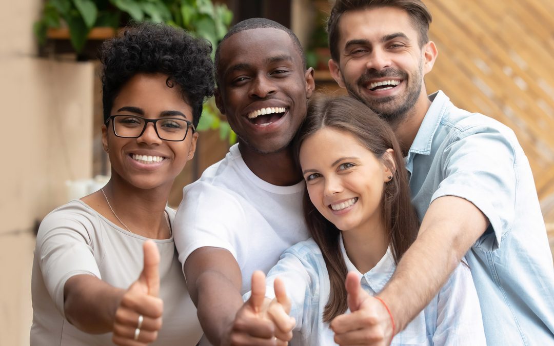 group of people thumbs up